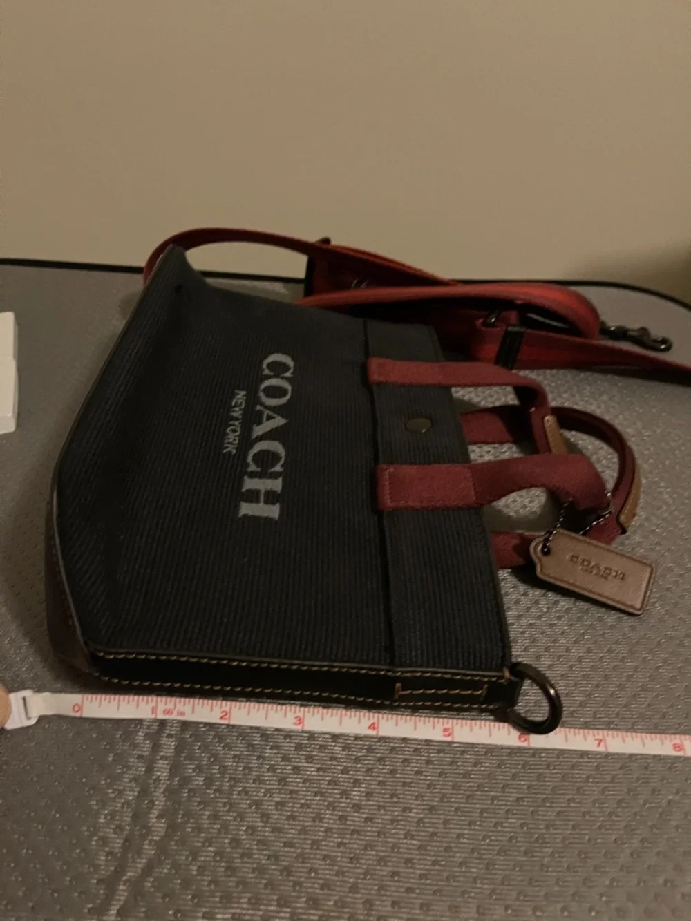 Unisex Coach Black Canvas Messenger Tote. Burgundy Handles & Red Striped Strap.